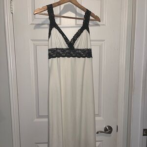 White Betsey Johnson slip dress from mid-2000s w/ black lace detailing. Size M.